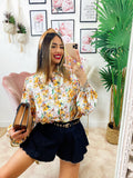 Camicia fiorata sfumature arancio