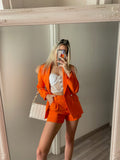 Completo giacca e short arancio