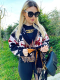 Cardigan corto frange e cinta con cavallo nero