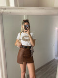 Gonna con borchie e cintura camel