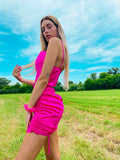 Abito in raso con arricciature fuxia