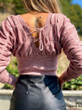 Maglione rosa con lacci