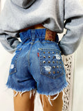 Short Levi’s Vintage con Borchie bagno medio
