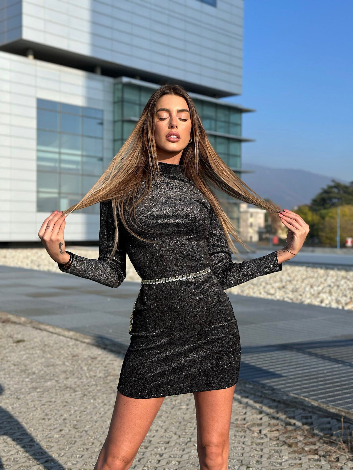 Abito schiena aperta glitter nero