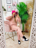 Completo maglia e pantalone largo rosa