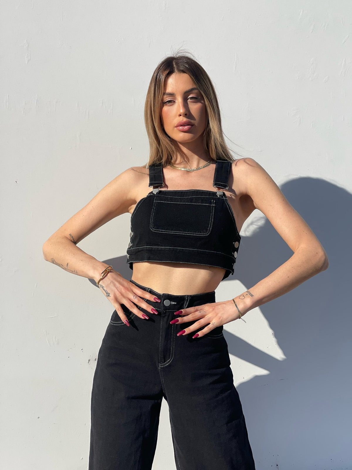 Completo top e jeans nero