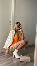 Giacca bianca con bottoni oro