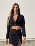 Completo giacca corta e gonna nero