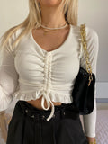 Top a costine bianco con Rouches