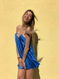 Abito in raso blu elettrico con punto luce