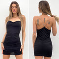 Abito con bretelle in strass