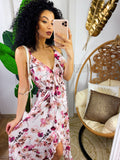 Abito con gonna asimmetrica e fiorellini rosa