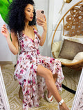 Abito con gonna asimmetrica e fiorellini rosa