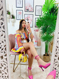Completo etnico dettagli fucsia