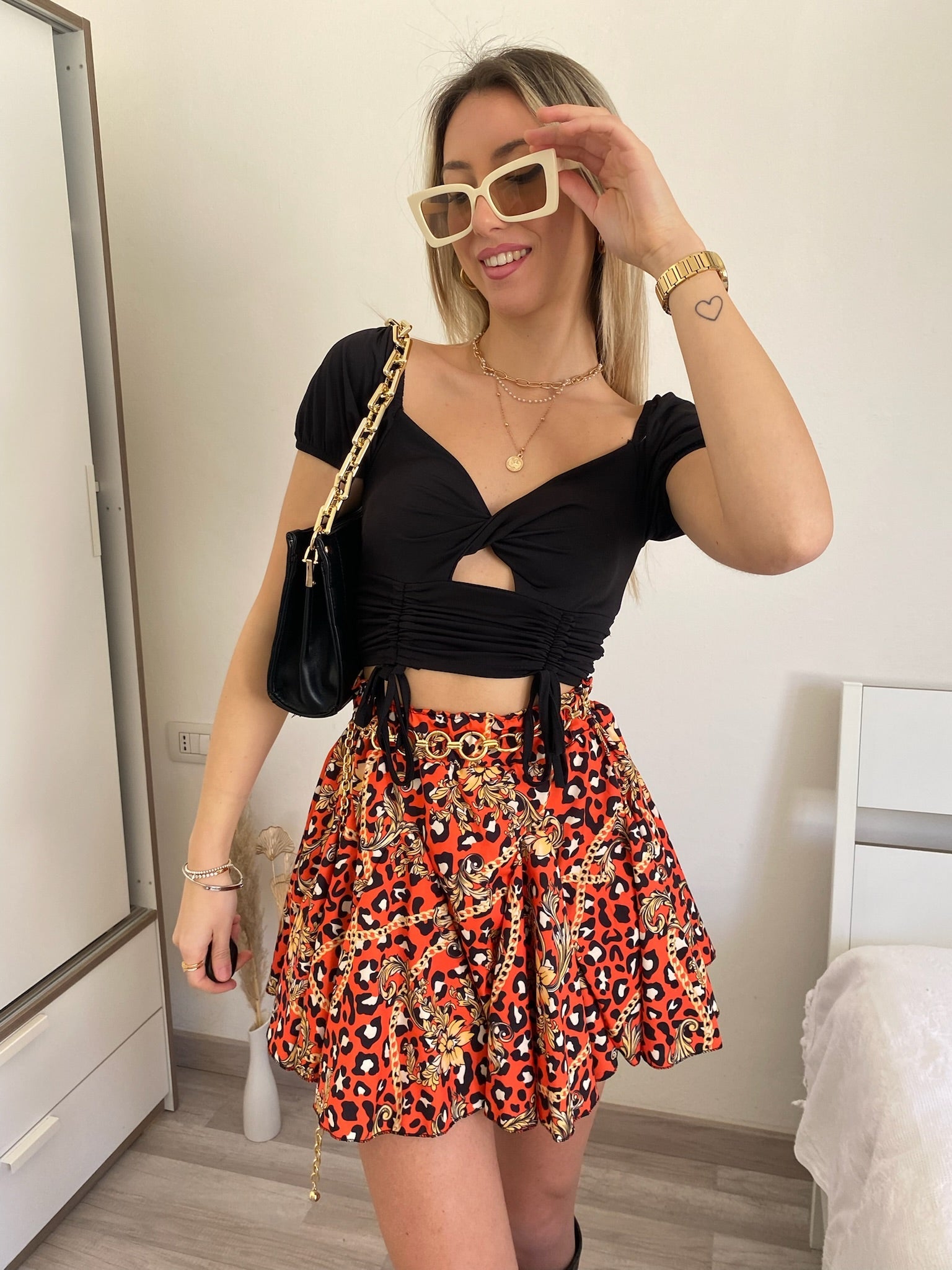 Top Nero con incroci