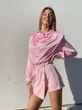 Tutina a portafoglio rosa