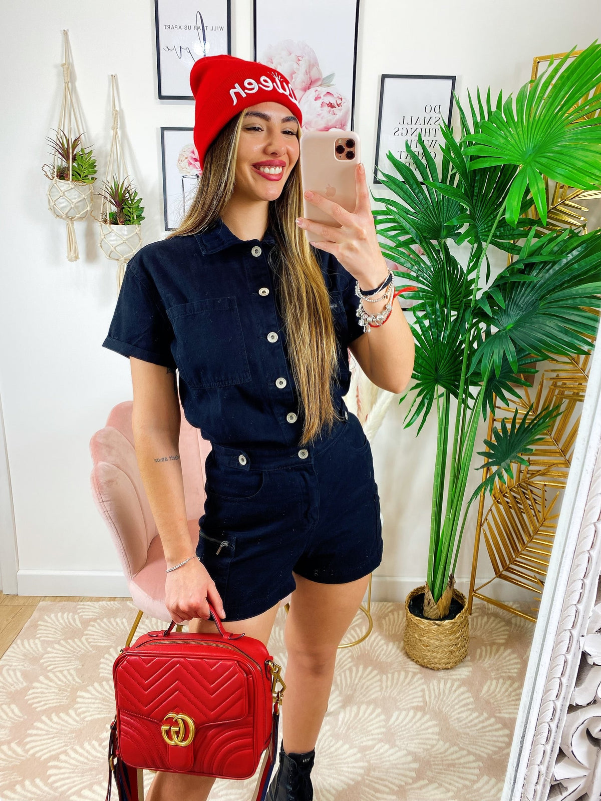 Tutina in jeans nera con tasche
