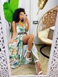 Abito in raso floreale con maxi spacco bianco