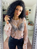 Blusa con ricami cipria