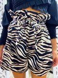 Short zebrato con fiocco