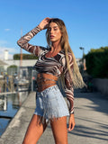 Maglia crop sfumature nude