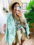 Camicia floreale con borsetta verdeacqua