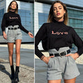 Pull nero e rosa