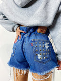 Short Levi’s Vintage bagno scuro con borchie