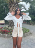 Maglia crop con piume bianco