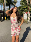 Abito in pizzo bianco con rose