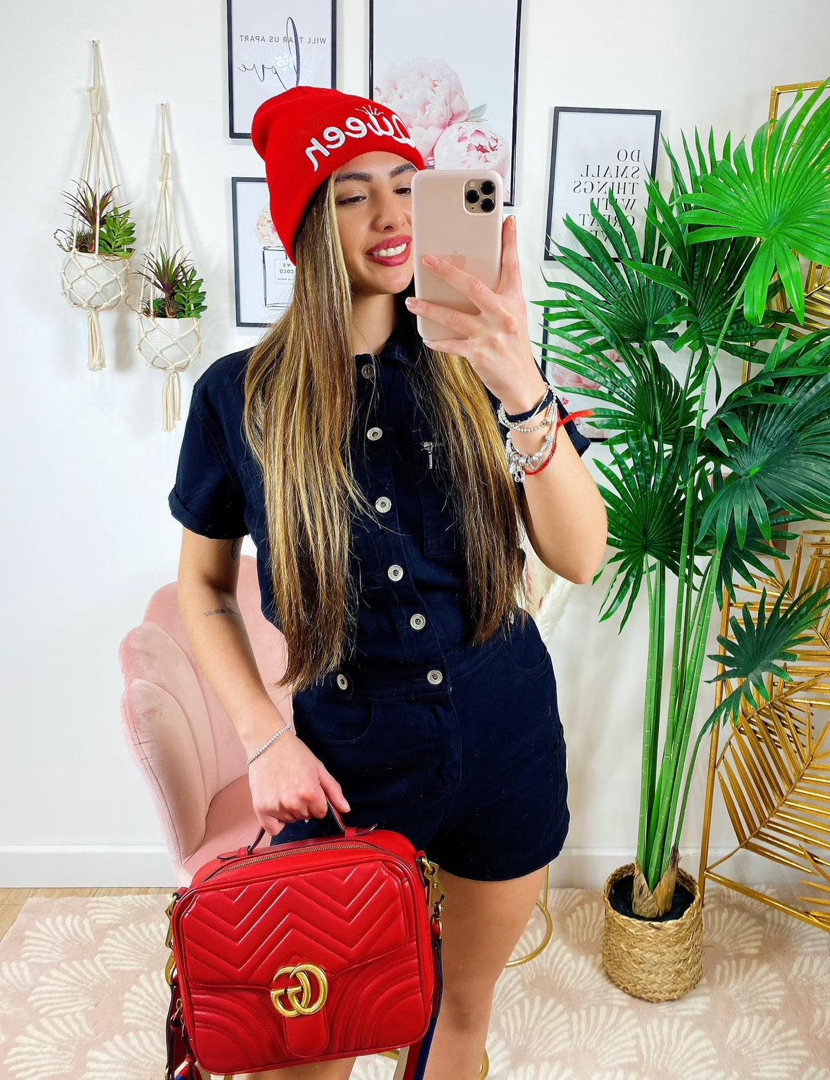 Tutina in jeans nera con tasche