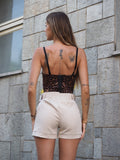 Completo giacca con bottoni e short beige