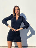 Abito glitter nero con bottoncini