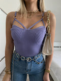 Top lilla con anelli oro