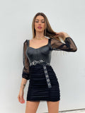 Abito in ecopelle e tulle