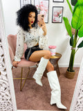 Short in eco pelle con tasche