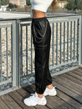 Pantalone in ecopelle con catenina nero