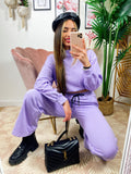 Jogger gamba larga e croptop lilla