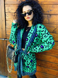 Cardigan verde con frange e cinta