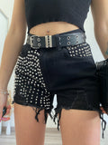 Jeans nero con borchie