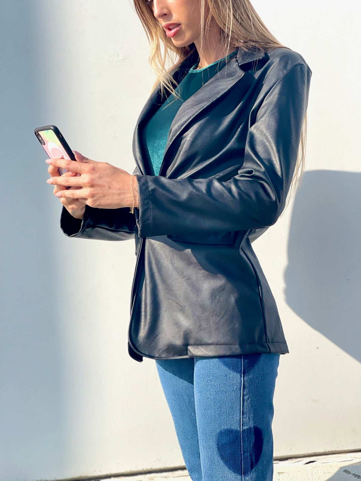 Giacca in eco-pelle con cintura