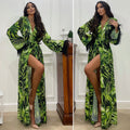 Abito con maxi spacco green con piume nere