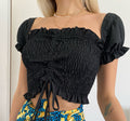 Top crop arricciato con manichina nero
