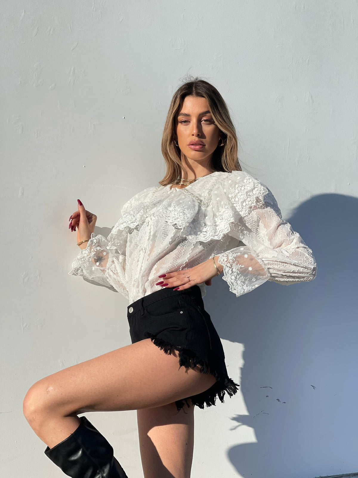 Short nero con borchie