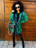 Cardigan verde con frange e cinta