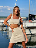 Completo top e gonna beige con perle