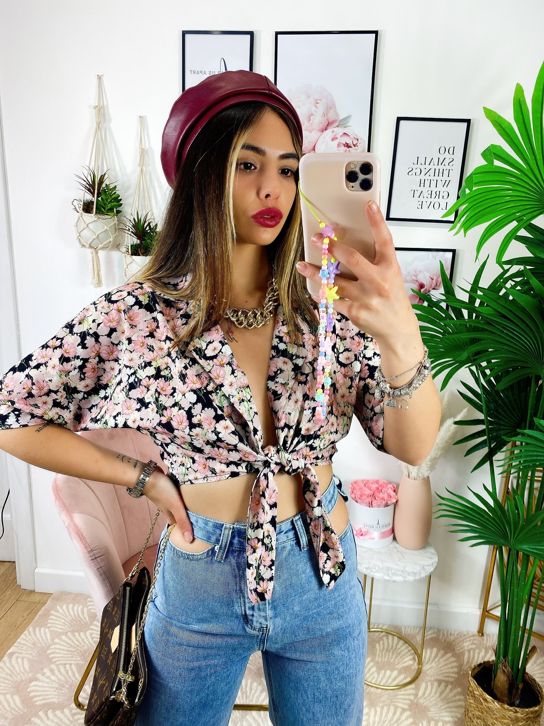 Blusa floreale con fiocco