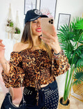 Blusa scollo a barchetta maculata