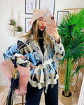 Cardigan frange e cinta con cavallo celeste corto