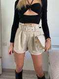Pochette a quadri beige